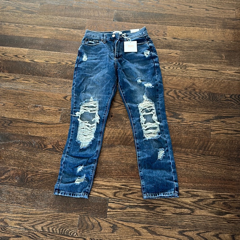 Dark denim jeans. In great condition. Never worn. Tags still attached